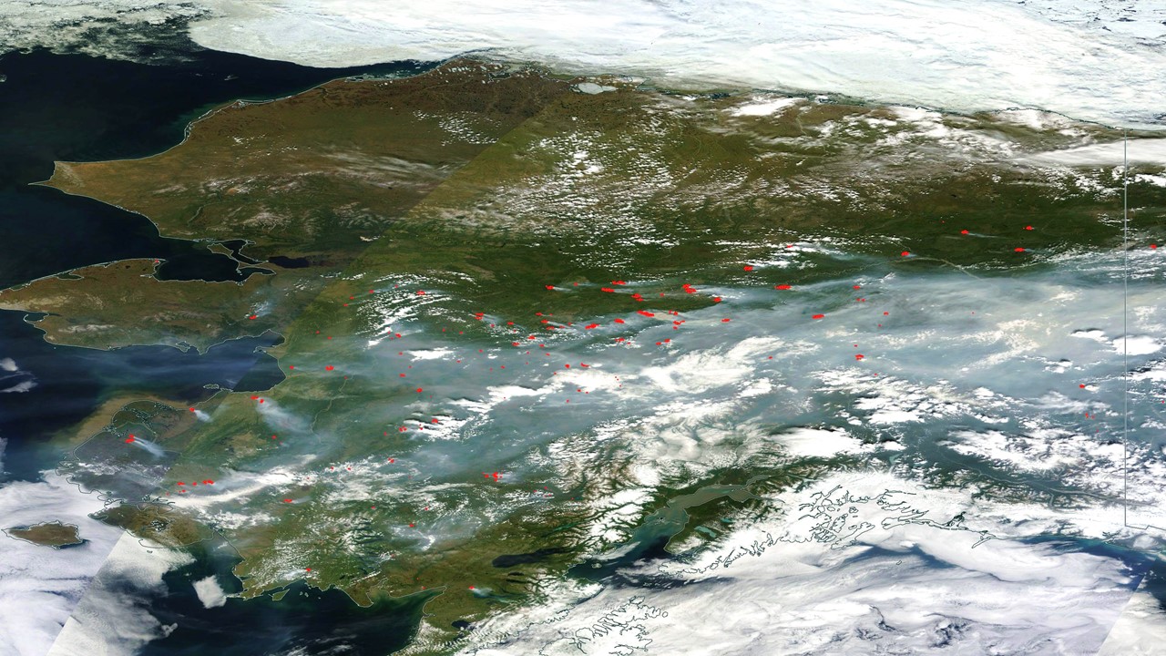 NASA MODIS satellite imagery of Alaska from 23 June 2015 showing infrared-sensed fire hotspots (red) dots from 260+ wildfires.