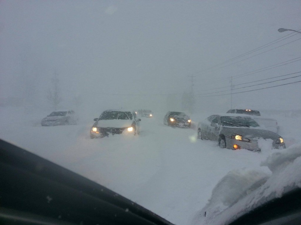 Cars stuck in a heavy snow squall on Tuesday morning, Nov. 18, 2014, presumably on the south side of Buffalo, NY.
