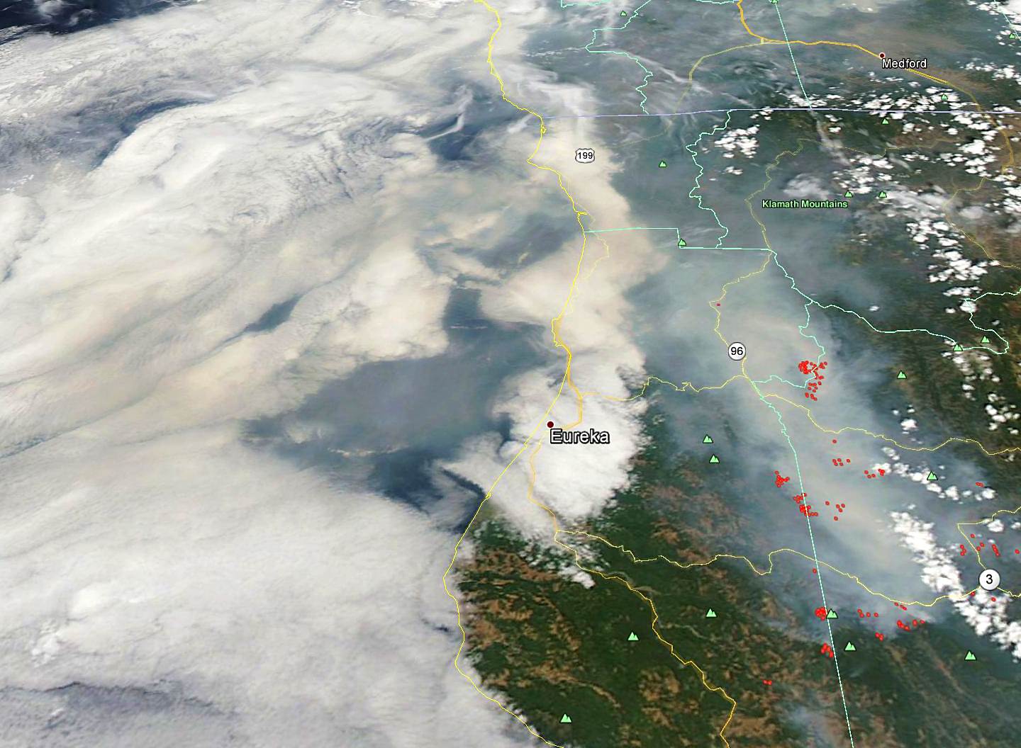 NASA color imagery from the Aqua satellite showing widespread wildfires over Northern California (remapped into Google Earth).