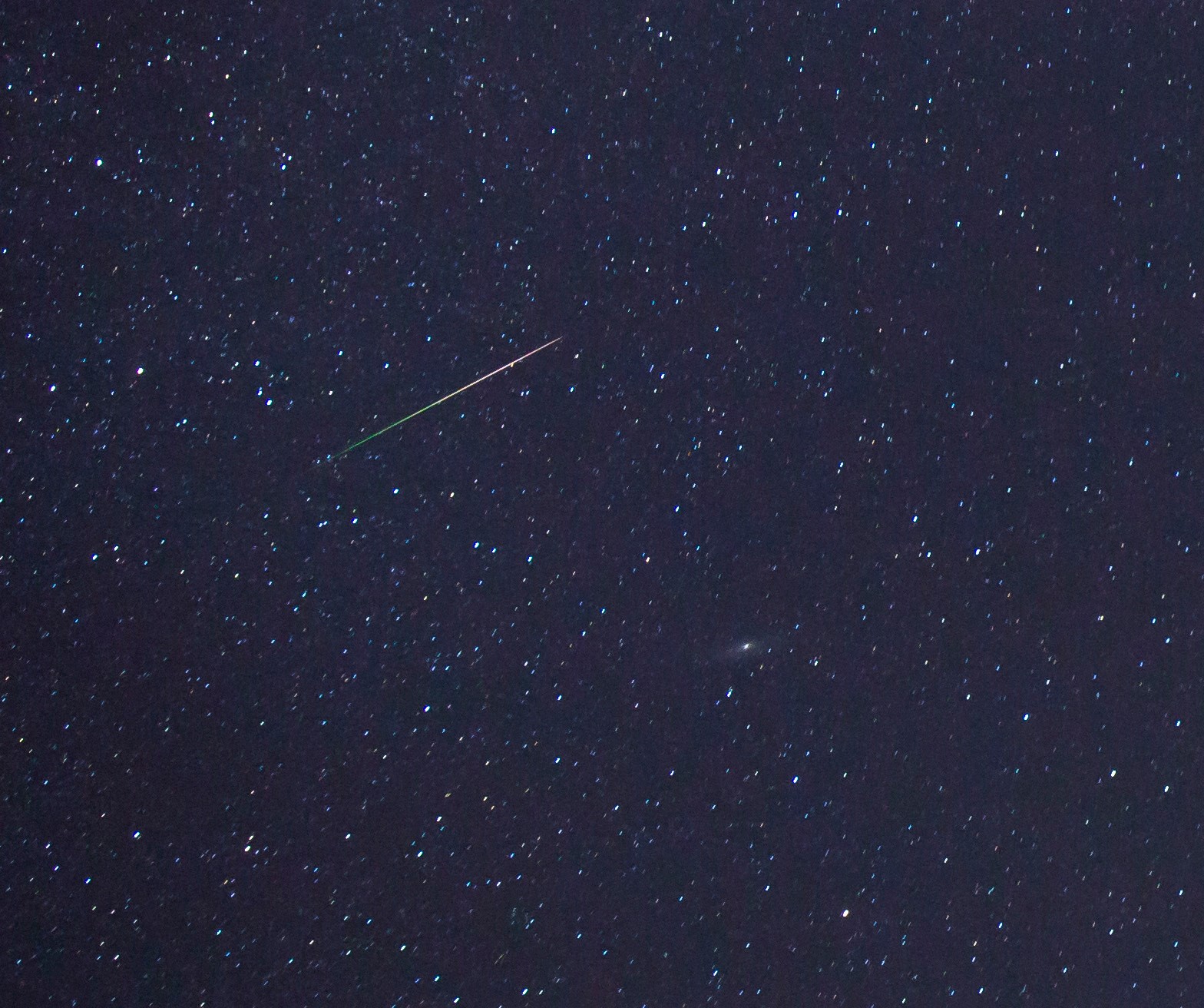 Perseid meteor near the Andromeda galaxy, August 13, 2015. Canon 6D with 16-35 f/4 lens wide open at 16mm, 30 sec exp, ISO800.